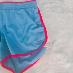 blue and pink the north face shorts